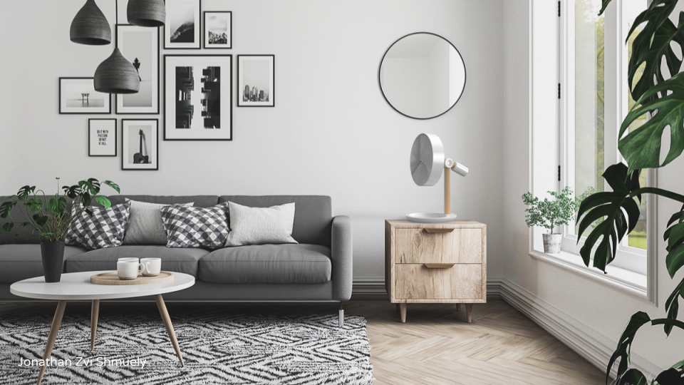 FFU fan with wooden stem in a living room next to a sofa